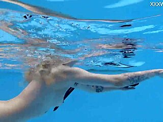 Finnish pornstar Mimi Cica strips naked underwater casually