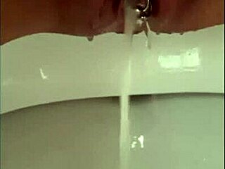 Close-Up Pissing Pussy and Pierced Clit View