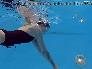 Finnish pornstar Mimi Cica strips naked underwater casually