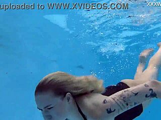Finnish pornstar Mimi Cica strips naked underwater casually