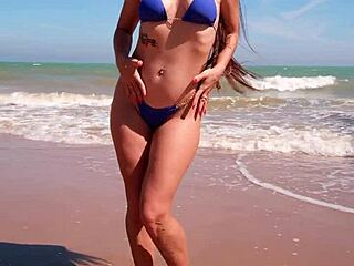 Petite Brunette Dances in Blue Bikini on Sunny Beach