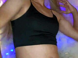 transvestite strokes cock in sexy outfit
