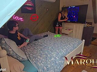 hot milf seduces young stud during pac-man fucks him hard and swallows his cum eagerly