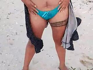 Horny Latina flashes tits and ass on Mexican beach
