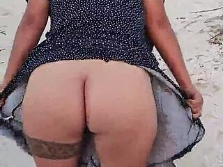 Horny Latina flashes tits and ass on Mexican beach