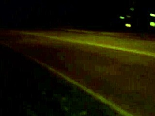 Peeing boldly on quiet street corner