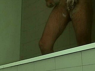 Delicious guy smoothly shaves his massive throbbing cock