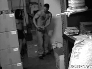 hot babe sneaks blowjob and pussy fuck in stock room spy cam