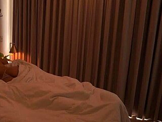 A muscular guy massages his busty redhead lover's huge ass early morning before spanking it shaking.