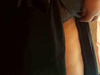 Horny Wife Flaunts Massive Tits in Fishnet Bra Tease