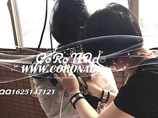 Bound Asian in Latex Catsuit Endures Outdoor Rubber Mummification Play