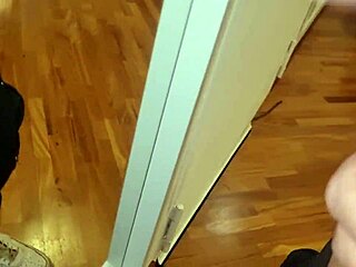 Leather beauty jerks cock to explosive cumshot amid perverse moans and piss