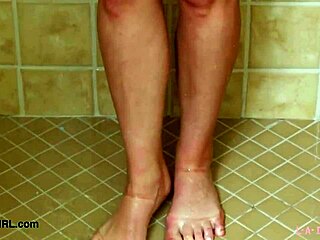 Captivating Blonde Model's Steamy Shower Tease