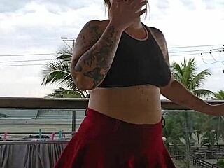 mystery skirt flash reveals bare ass on balcony exhibition