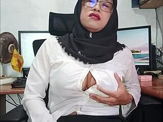 Hijab-Wearing Asian Ladyboy Strokes Her Hard Cock!