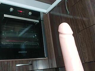 skinny brunette shoves huge dildo deep in hairy wet pussy moaning loud