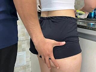 Cumming deep in big ass with shorts pulled aside while washing dishes