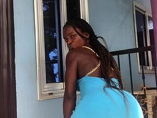 Crazy bitch shakes her ass wildly twerking on outdoor balcony.