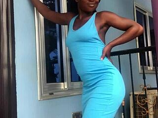 Crazy bitch shakes her ass wildly twerking on outdoor balcony.