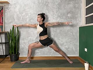 hot tattooed girl stretches in homemade yoga class posing sexy
