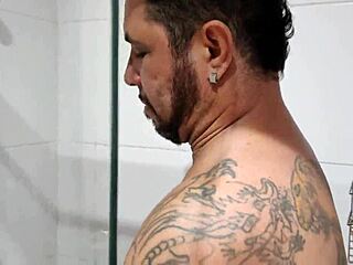 Pornstar Brasil bear jerks huge cock shower cum!