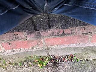 oops peeing my jeans outdoors so wet now