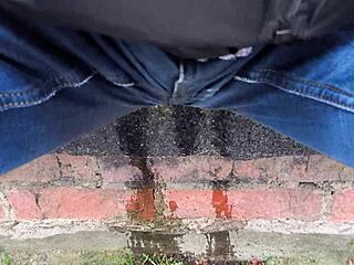 oops peeing my jeans outdoors so wet now