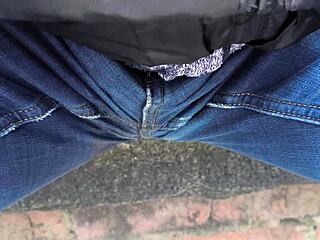 oops peeing my jeans outdoors so wet now