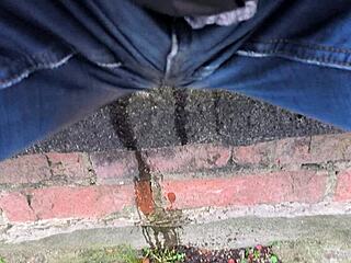 oops peeing my jeans outdoors so wet now