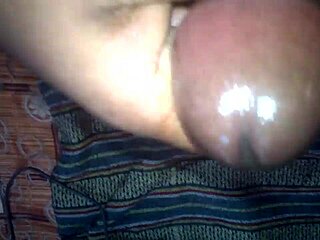 Oily Indian cock erupts in massive cumshot
