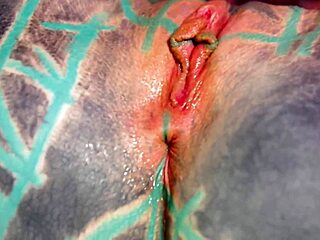 Tattooed beauty fists ass in wild solo play