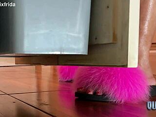 Intriguing bare feet tease from furry slippers in kitchen