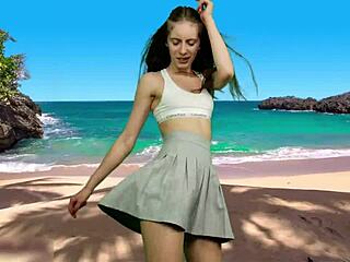 curvy teen dances panty-free on beach