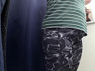watch this chubby milf's big ass squeeze into tight leggings?
