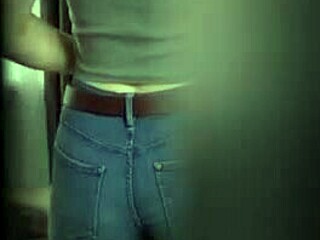secretary's tight jeans hide panty line but her big ass teases at work!