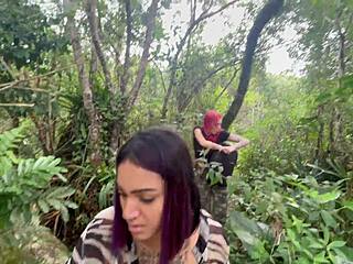 redhead strolls through wild woods casually