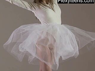 blonde gymnast stretches naked acrobatically in gym!