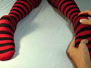 Soles massage and tickling with stripped socks feels intense