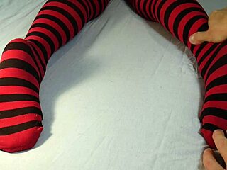 Soles massage and tickling with stripped socks feels intense