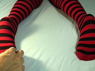 Soles massage and tickling with stripped socks feels intense