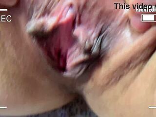 German blonde rolls a condom on with her mouth and fucking hands
