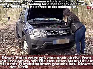 German woman fixes car issue with mechanic in forest